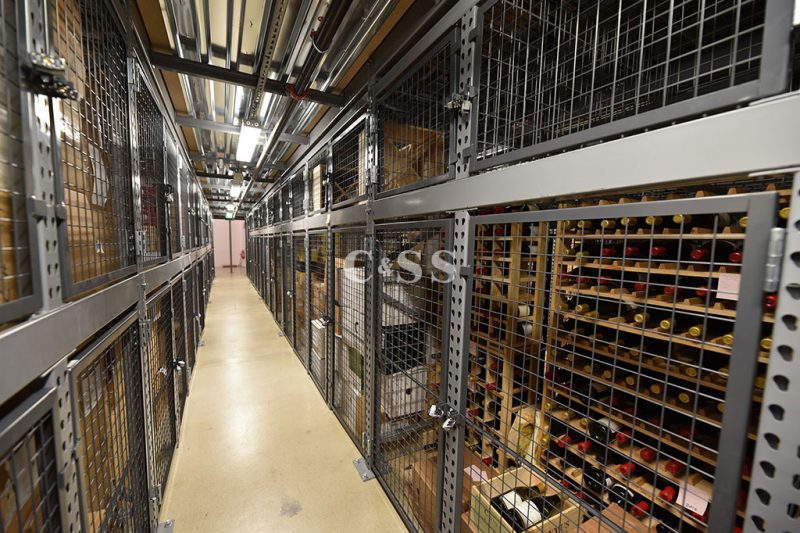 San Diego Wine Company Aisle Showcasing The Large Walk In Security Cages